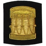 Embroidered Gold wire on black cloth drum insignia badge
