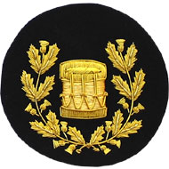 Embroidered Gold wire on black cloth wreathed drum Drum Major insignia badge