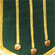 Green piper doublet with gold braid trim Inverness skirt detail